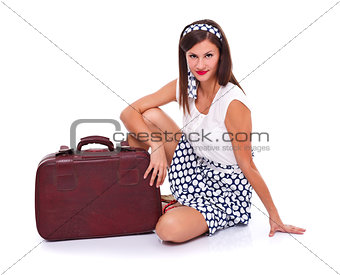 Posing with suitcase