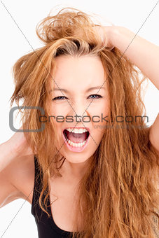 Frustrated Girl with Long Brown Hair Screaming
