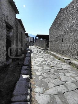 Preserved remains. Streets and colonnades of the ancient Roman city of Pompeii