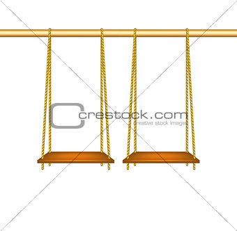 Wooden swings hanging on ropes