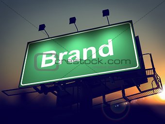 Brand on Green Billboard at Sunrise.