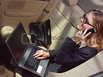 businesswoman has a fan with laptop