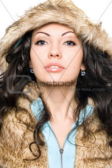Portrait of perfect young brunette in the hood