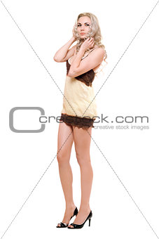 Attractive young blonde in dress. Isolated