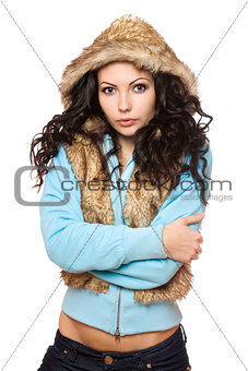 Portrait of perfect young brunette in the hood. Isolated