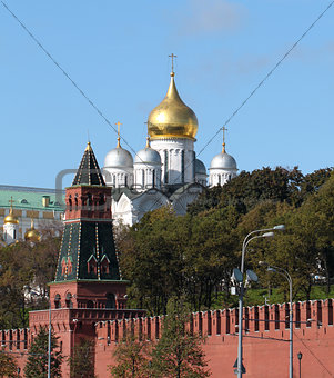 Moscow Kremlin tower on the background of the cathedral