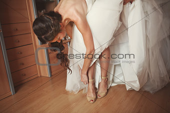 Beautiful young  bride is getting ready
