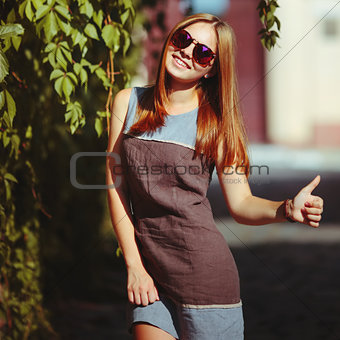 beautiful teenage girl in sunglasses.