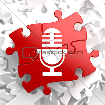 Microphone Icon on Red Puzzle.
