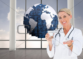 Composite image of happy doctor holding out pills and water glass