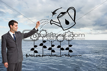 Composite image of happy businessman touching