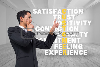 Composite image of thoughtful asian businessman pointing