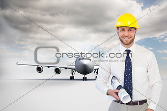 Composite image of cheerful young architect posing