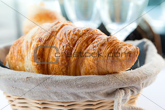 fresh croissants in a basket