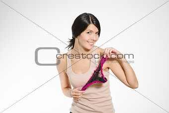 Laughing woman displaying sexy lacy panties