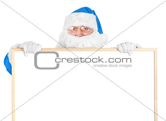 Blue Santa and empty white board 