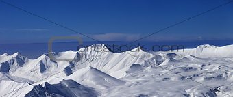 Panorama of snowy plateau at nice day