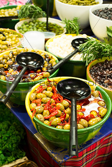 Olives in bowls in a shop
