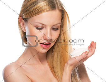 Portrait of teenage girl with soap bar