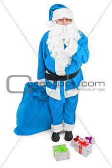 Funny blue Santa asks to be quiet 