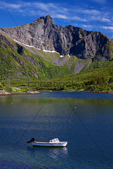 Motor boat in fjord