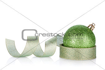 Green sparkling christmas bauble with ribbon