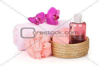 Cosmetics, towel and orchid flowers