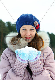 Portrait of young brunette woman in winter