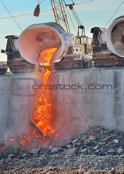 molten slag is poured on a railway platform
