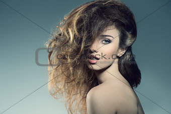woman with bushy  hair 