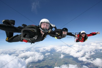 Skydivers form a formation