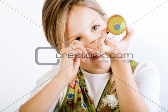Young girl painting easter egg