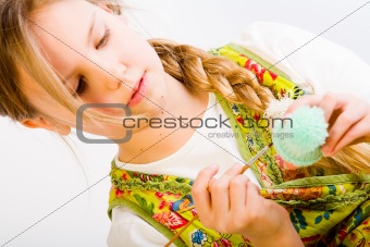 Young girl concentrated on painting