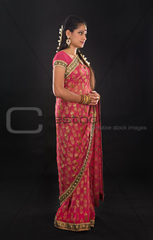 Full body traditional young Indian girl in sari