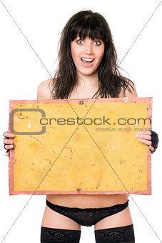 Surprised brunette taking vintage yellow board