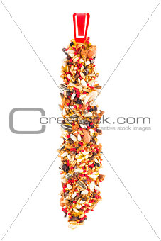 closeup of a birdseed bar on a white background 
