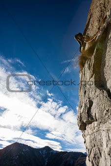 Rock climber on a rock face.