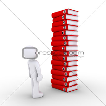 Person is frustrated by pile of folders