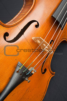 Violin against a black background