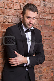 Elegant macho man in a bow tie