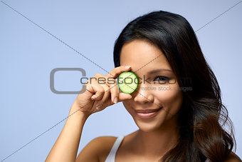Asian girl using beauty cream and cosmetics