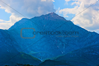 beautiful mountain peak in blue against the sky
