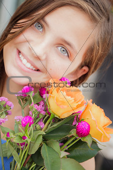 Pretty Young Girl Holding Flower Bouquet at the Market