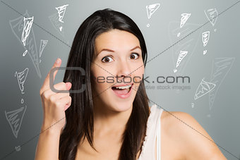 Young woman raising her index finger