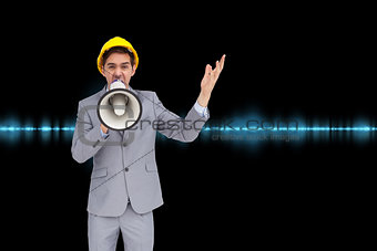Composite image of architect with hard hat shouting with a megaphone