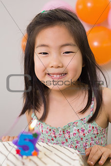Cute little girl at her birthday party