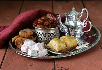 Assorted eastern sweets - baklava, dates, turkish delight