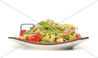 Pasta tagliatelle with shrimp and arugula