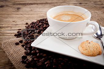 fresh aromatic coffee and cookies on table