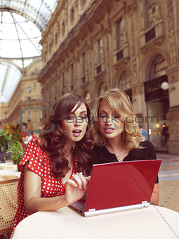 happy businesswomen with laptop